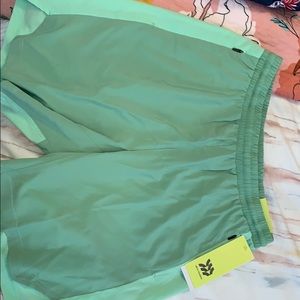 Green men’s running shorts